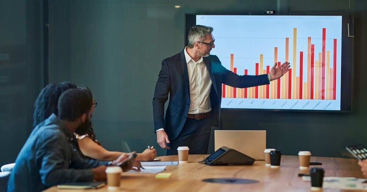 A sales manager reviews his team's quarterly sales statistics.